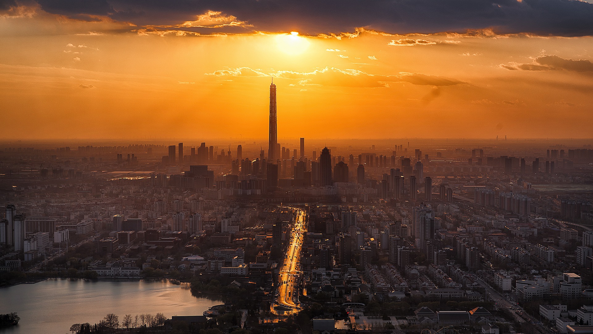 picture of the sun over a city