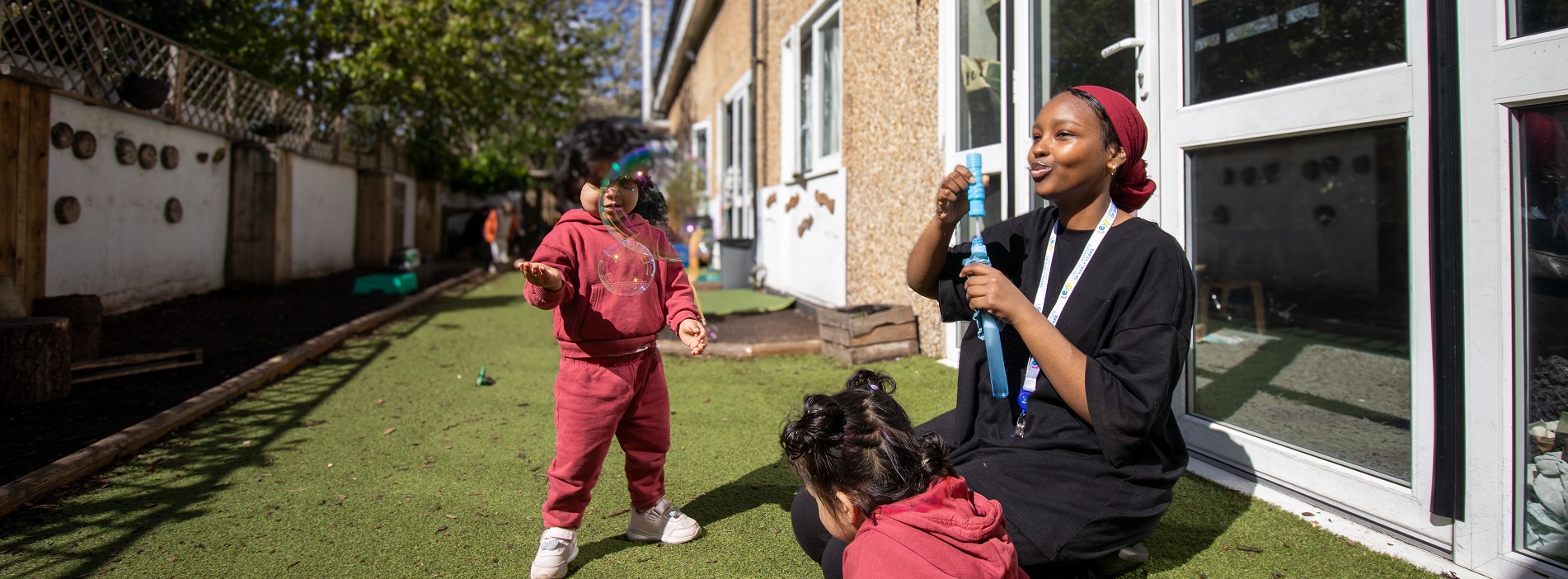Toddlers playing with bubbles at London Early Years Foundation's Deanery Road nursury