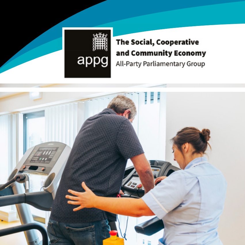 A nurse supporting a man on a treadmill