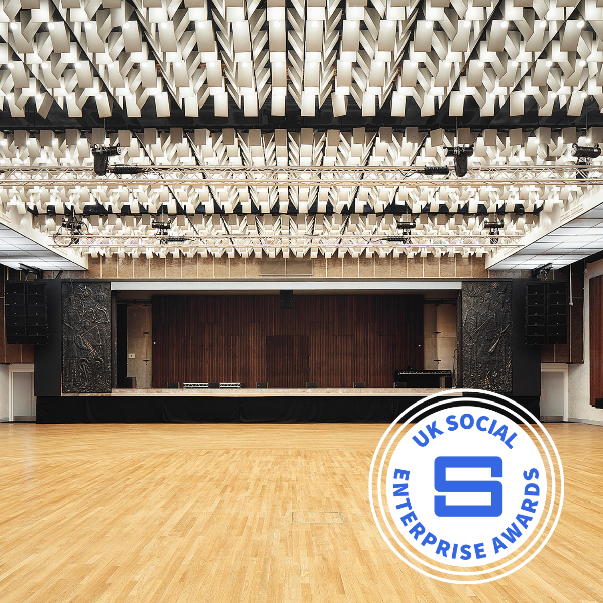 New Century Hall with the Awards logo in blue and white
